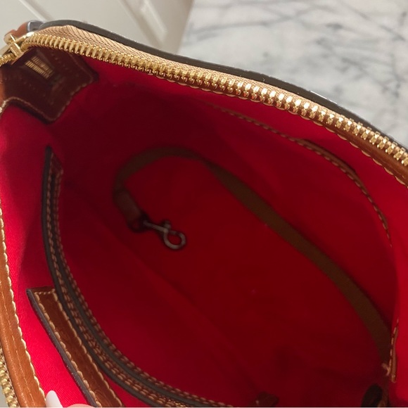 Dooney & Bourke White Ostrich Leather purse.
Brand new condition only used once. - Picture 10 of 11